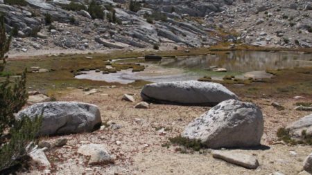 Small lake in the outlet stream of Trail Lakes, 10,150